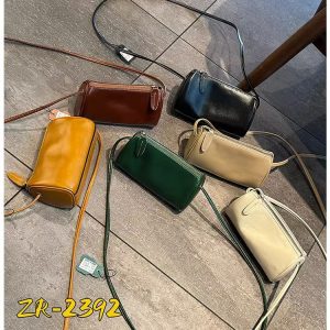 Elegant Genuine Leather Crossbody Bag for Women - Detachable Shoulder Strap, Zipper Closure & Tassel Detail | Multi-Functional Lightweight Travel Purse with Secure Zipper Closure | Durable Fabric Lining | Minimalist Design in Beige, Dark Brown, Green, Yellow, Small Crossbody Bag, Everyday Handbag, Sophisticated Accessory, Textured Finish